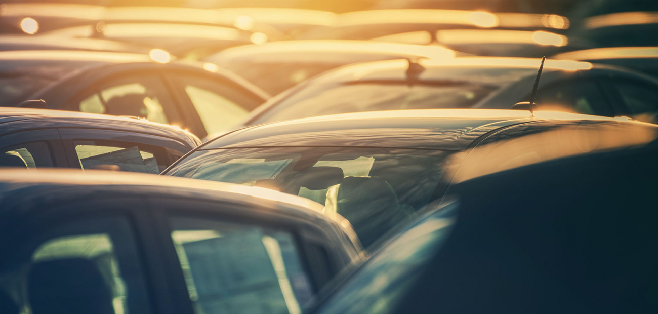 group of cars in a rental facility