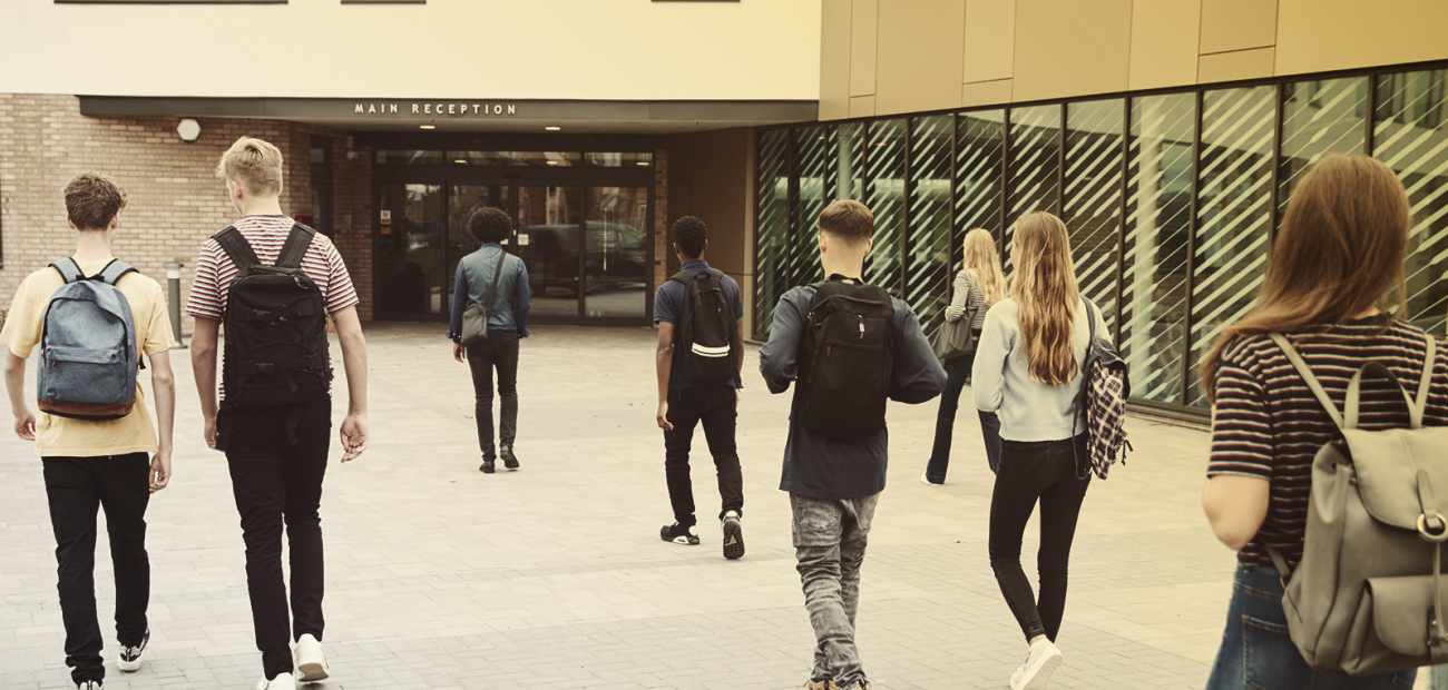 Students entering a school building