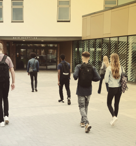 Students entering a school building